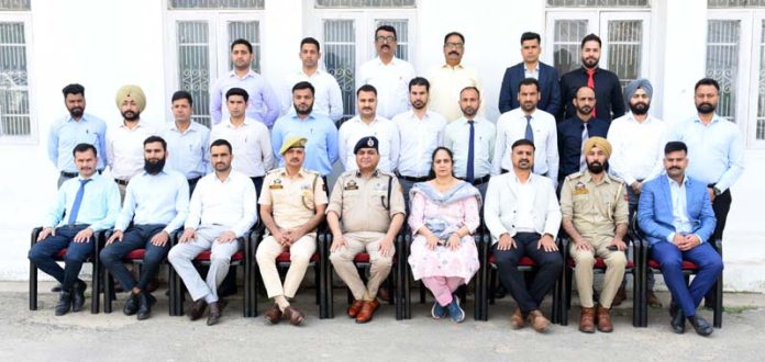 Police officers participating in a training program at SKPA Udhampur posing for a group photograph.