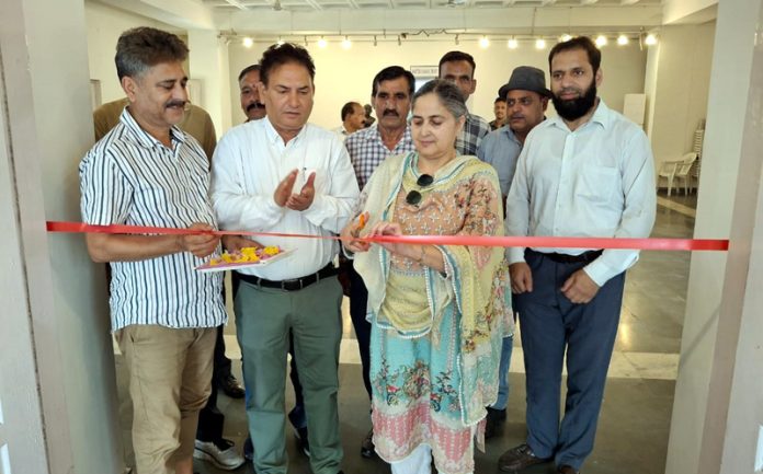 Secretary JKAACL, Harvinder Kour inaugurating an art exhibition at Kala Kendra Jammu on Tuesday.