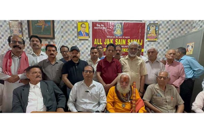 AJKSS president Kewal Krishan Fottra and other members posing together during birthday celebration of Baba Sain Bhagat. AJKSS president Kewal Krishan Fottra and other members posing together during birthday celebration of Baba Sain Bhagat.