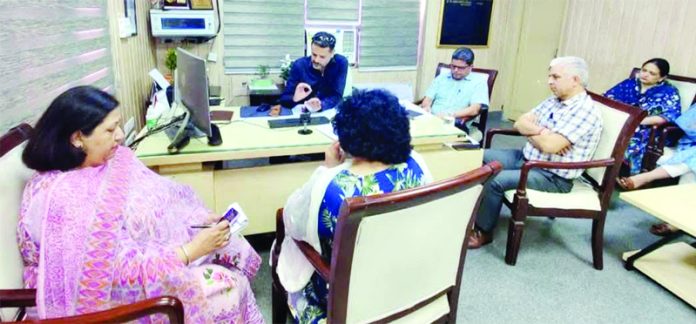 DHS Jammu, Dr Abdul Hamid Zarger, chairing a meeting on Saturday.