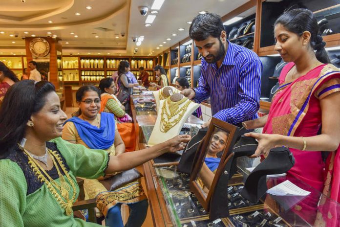 Gold tanks Rs 3,400 to Rs 96,550/10 g  as US-China trade deal curbs demand