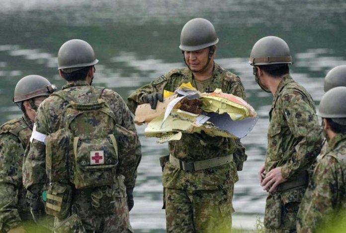 Japan starts emergency inspections on nearly 200 military training planes after crash Japan starts emergency inspections on nearly 200 military training planes after crash
