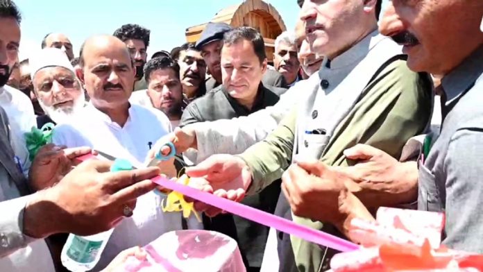 Minister Javid Dar inaugurating macadamization work at Sopore Fruit Mandi on Wednesday. Minister Javid Dar inaugurating macadamization work at Sopore Fruit Mandi on Wednesday.