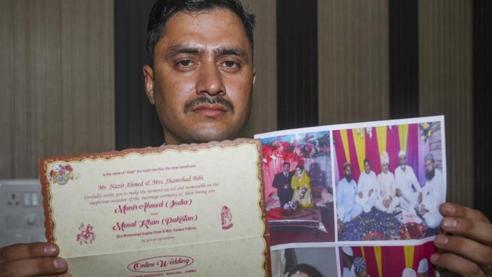 Munir Khan, who was dismissed from CRPF for “concealing” his marriage with a Pakistani woman, displays photos, in Jammu