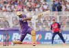 Andre Russell playing a shot during his inning of unbeaten 57 runs in 37 balls at Kolkata on Sunday.