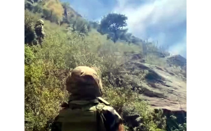 Troops during search operation at Chatroo, Kishtwar on Thursday.