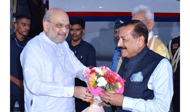Union Minister of State in PMO Dr Jitendra Singh receiving Union Minister Amit Shah at technical airport in Jammu on Thursday evening.