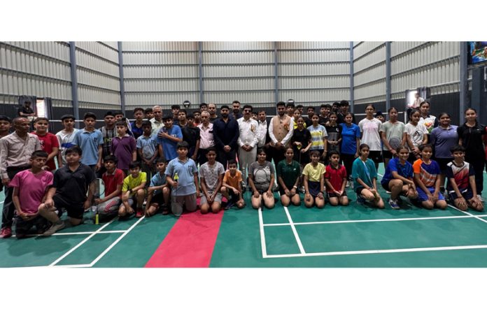 Dignitaries posing along with players during inaugural event.