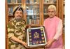 R S Bhatti, DG CISF presenting memento to LG Manoj Sinha.