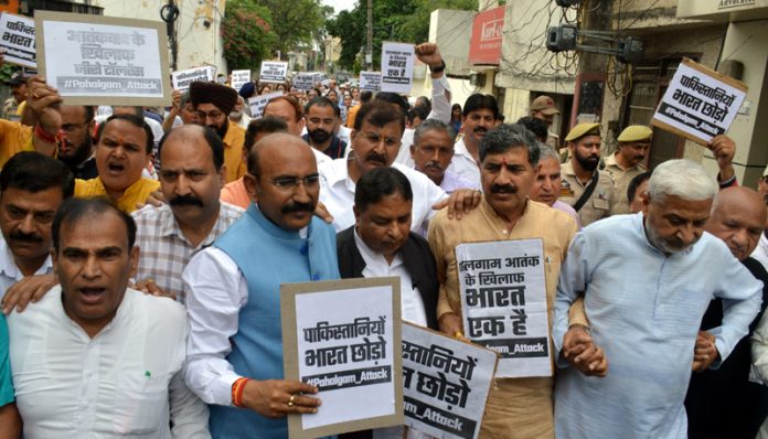 BJP leaders in a procession to DC Office Jammu on Monday. -Excelsior /Rakesh