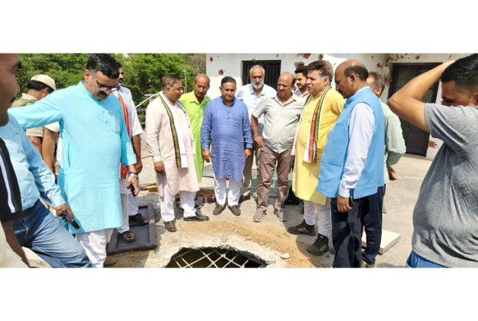 BJP leaders led by its president, Sat Sharma during tour of shelling hit areas of Nowshera on Monday.
