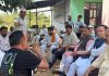 BJP leaders during meeting with martyr’s family in village Trewa on Monday