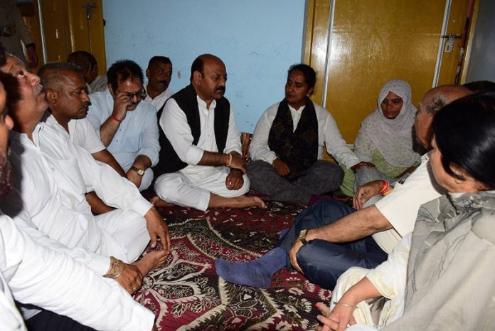 Dy CM meeting family of Rifleman Sunil Kumar.