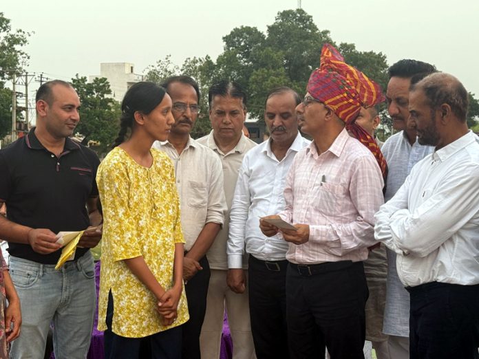 DC Samba distributing scholarship among students.