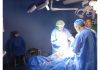 A team of doctors conducting complex, life-saving C-Hysterectomy at DH Bandipora.
