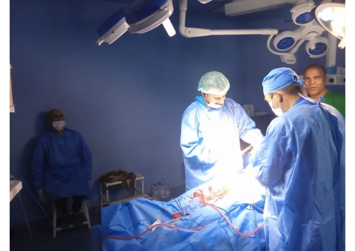 A team of doctors conducting complex, life-saving C-Hysterectomy at DH Bandipora. A team of doctors conducting complex, life-saving C-Hysterectomy at DH Bandipora.