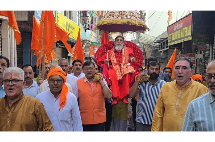 Religious procession being taken out to mark the celebrations of `Ganga Dashera' in Rajouri on Wednesday.