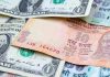 Rupee falls 1 paisa to close  at 85.59 against US dollar