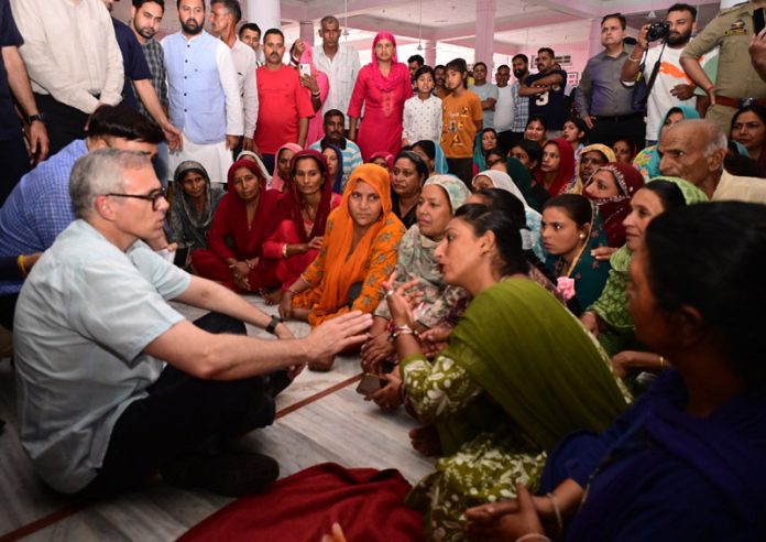 CM Omar Abdullah interacting with border people at a camp on Friday. Another pic on page 4.