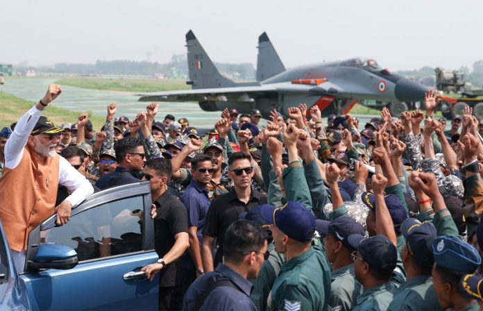 PM Narendra Modi with Army soldiers at Adampur air base in Punjab on Tuesday.