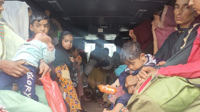 Border residents being shifted to safer places from the Pakistani shelling zones, in Mendhar area of Poonch district on Friday. (UNI). Another pic on page 4. Border residents being shifted to safer places from the Pakistani shelling zones, in Mendhar area of Poonch district on Friday. (UNI). Another pic on page 4.