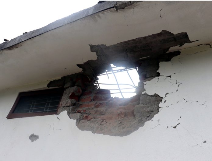 A house damaged in shelling from Pakistan in Poonch. (UNI) A house damaged in shelling from Pakistan in Poonch. (UNI)