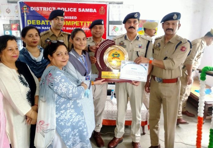 SSP Samba Virinder Manhas with police officials, school staff and students.