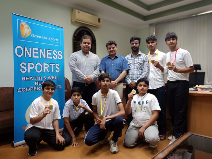 Bal Krishan, Additional Registrar Cooperative posing along with medallists.