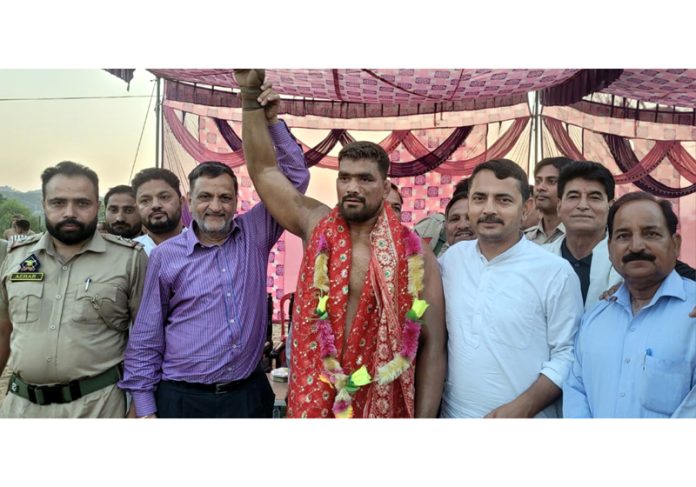 Winner wrestler Bablu posing with MLA Ranbir Singh Pathania and dignitaries at 13th Koarnu Dangal 2025. Winner wrestler Bablu posing with MLA Ranbir Singh Pathania and dignitaries at 13th Koarnu Dangal 2025.