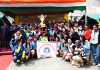 Archery teams of EJM College Leh posing with their trophy at Kargil Campus of the University of Ladakh.