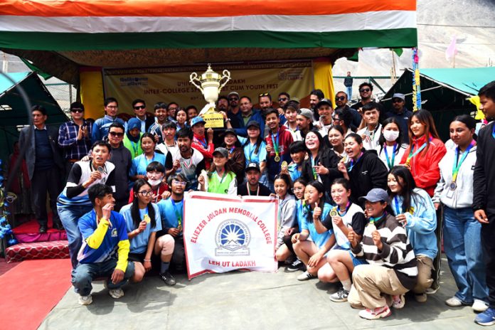 Archery teams of EJM College Leh posing with their trophy at Kargil Campus of the University of Ladakh. Archery teams of EJM College Leh posing with their trophy at Kargil Campus of the University of Ladakh.