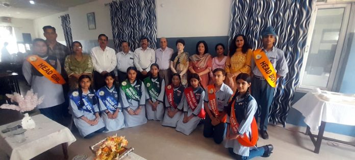 Newly elected students council posing along with dignitaries.