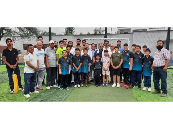 Players posing along with dignitaries during a programme.