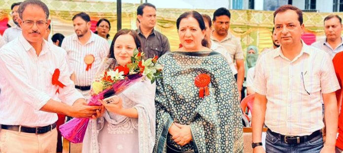 MLA Kishtwar Shagun Parihar receiving bouquet during a programme. MLA Kishtwar Shagun Parihar receiving bouquet during a programme.