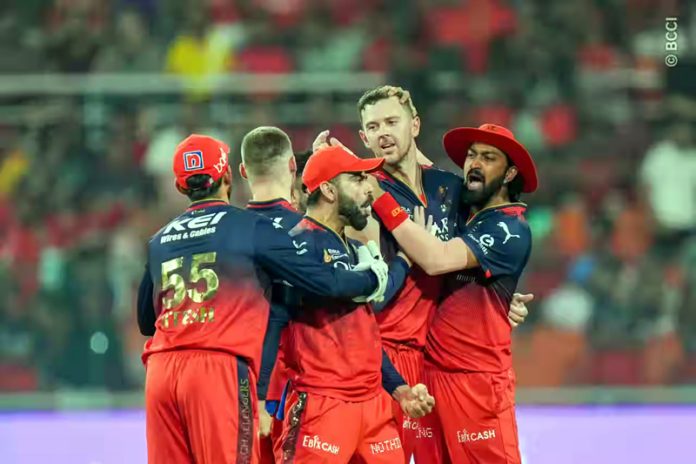 RCB players celebrating victory against Punjab Kings.