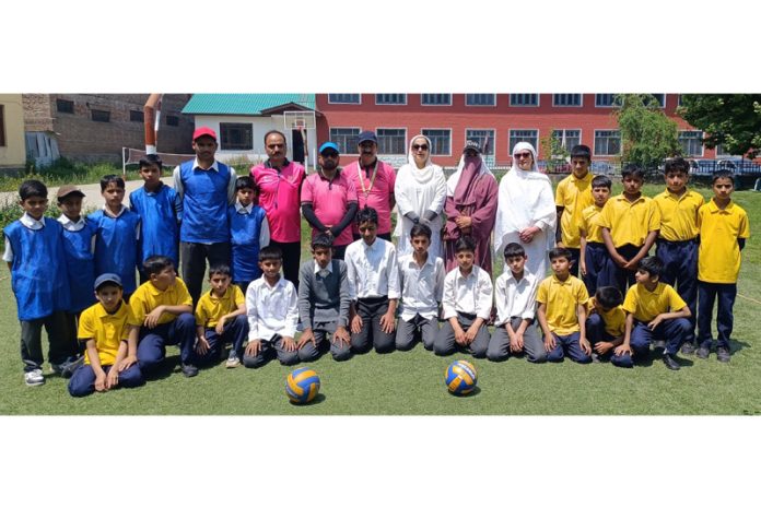 Players posing along with dignitaries.