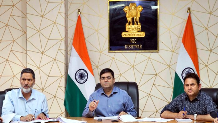 DC Kishtwar chairing a meeting on Friday.