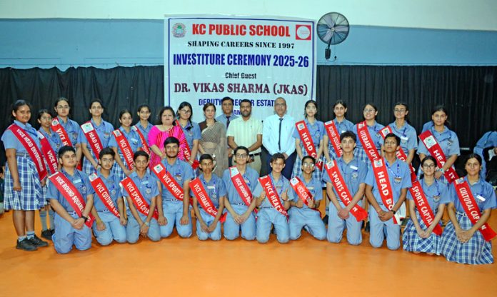 Newly elected students council posing along with school management and dignitaries.