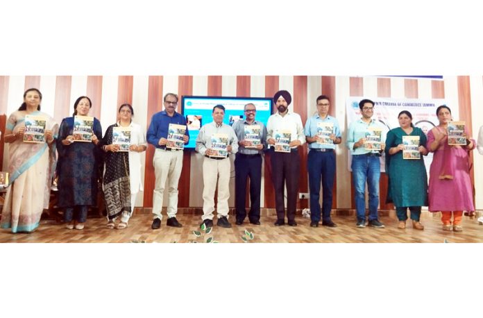 Financial Commissioner releasing SPMR College newsletter.