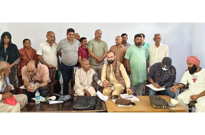 HoD Cardiology GMC & SSH Jammu Dr Sushil Sharma examining patients at Bishnah on Sunday. HoD Cardiology GMC & SSH Jammu Dr Sushil Sharma examining patients at Bishnah on Sunday.