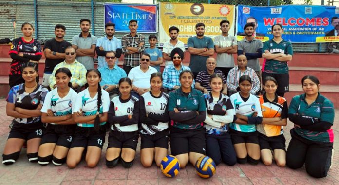 Players posing along with dignitaries during volleyball match. Players posing along with dignitaries during volleyball match.