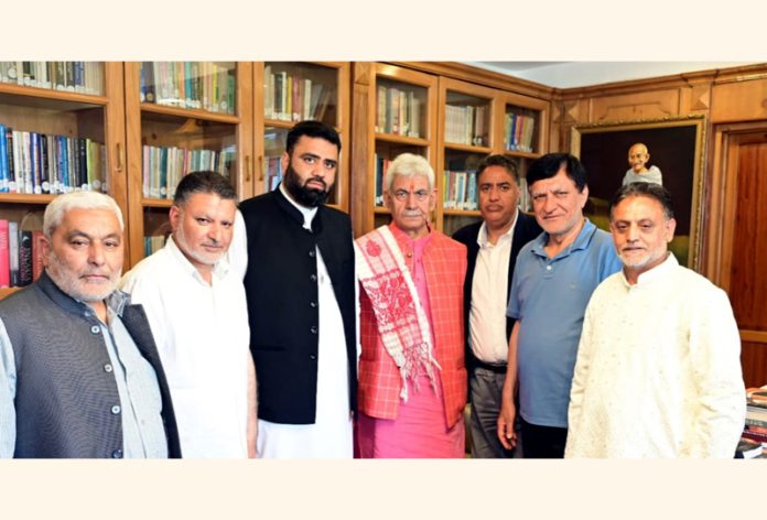 Lieutenant Governor Manoj Sinha meeting delegation of Anjuman Sharie Shian on Tuesday.
