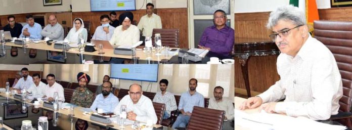 CS Atal Dulloo chairing a meeting at Srinagar on Thursday.