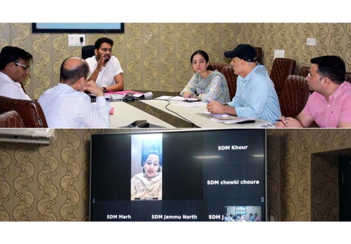 DC Jammu chairing a meeting on Wednesday.