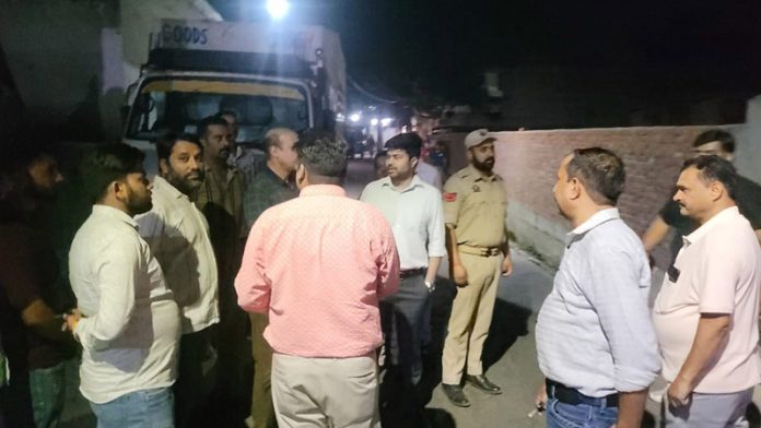 A truck loaded with polythene seized by officials of JMC at Rajiv Nagar, Jammu.
