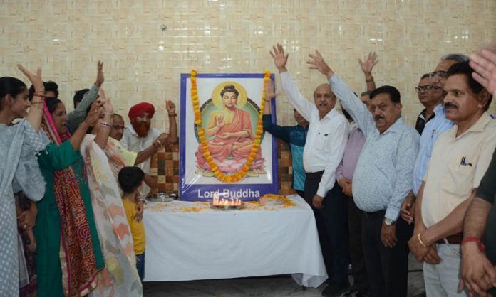 People celebrate Buddha Jayanti at Guru Ravi Dass Sabha.