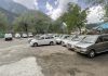 Cabs parked in stands in absence of tourists in Pahalgam. -Excelsior/Sajad Dar