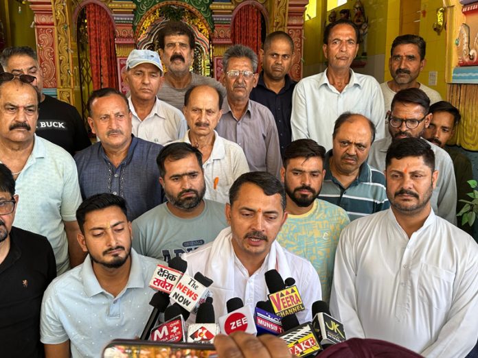 R S Pathania talking to media persons during meeting with locals at village Kashirah in Udhampur on Wednesday.