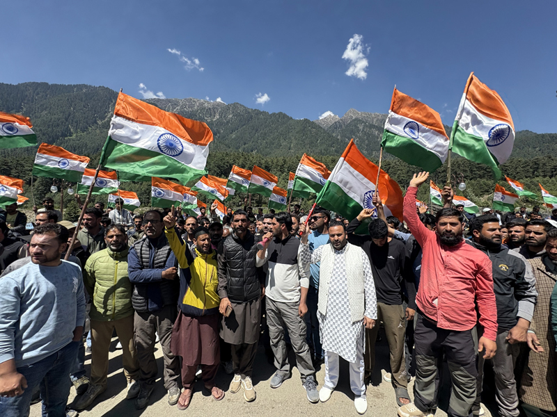 BJP activists taking out Tiranga rally at Pahalgam on Thursday.-Excelsior/Sajad Dar
