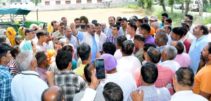 DyCM Surinder Choudhary interacting with people in Nowshera constituency on Thursday. DyCM Surinder Choudhary interacting with people in Nowshera constituency on Thursday.